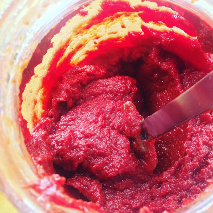Image of Pack the tomato mixture into your fermentation jar. You do...