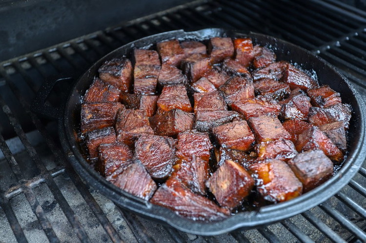 Image of Sauce will have reduced to very little, but will have coated the brisket nicely and started to slightly char the edges. Remove from the grill and serve warm.