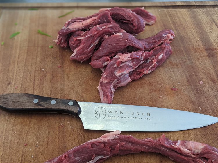 Image of Trim your tenderloin straps removing any hard fat and silver-skin...