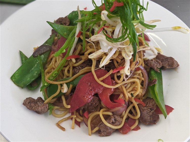 Image of Transfer portions to a bowl, top with bean sprouts, spring...