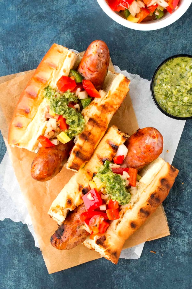 Image of Choripán: Grilled Argentine Chorizo with Chimichurri and Salsa Criolla