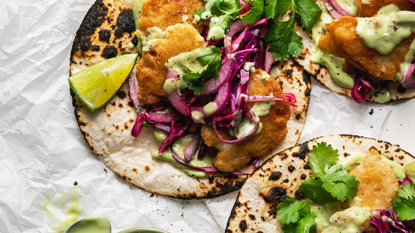 Image of Crispy Fish Tacos with Tahini Avocado Crema