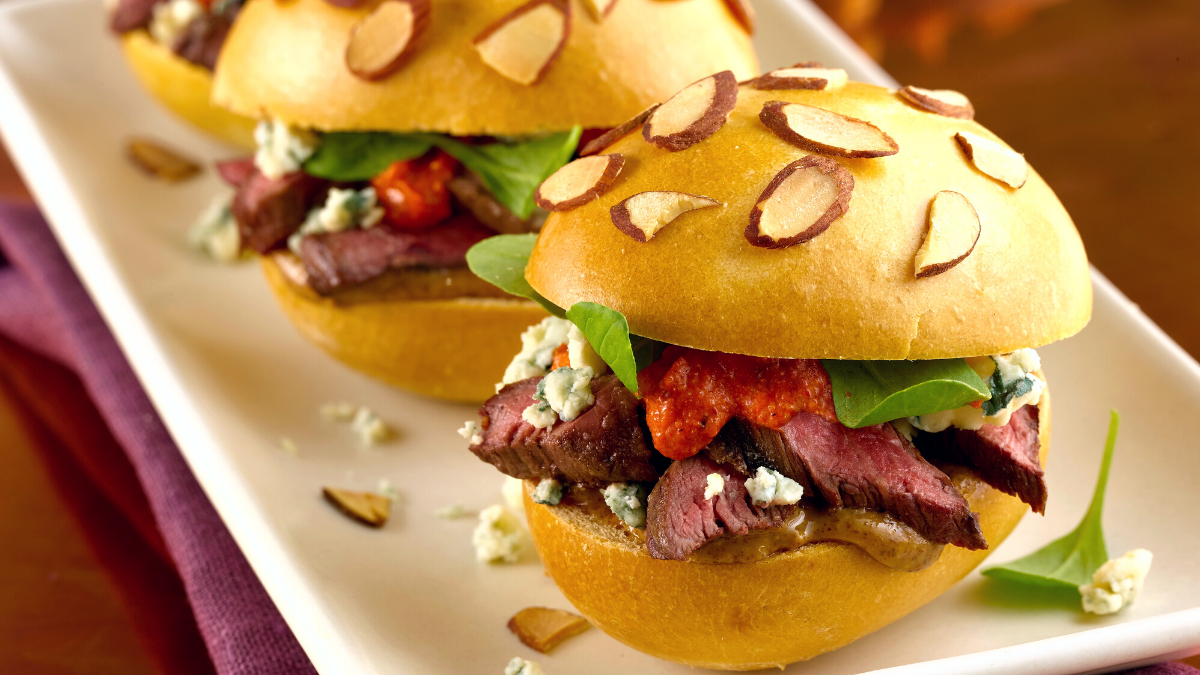 Image of Grilled Skirt Steak Sliders with Smoked Almond Romesco