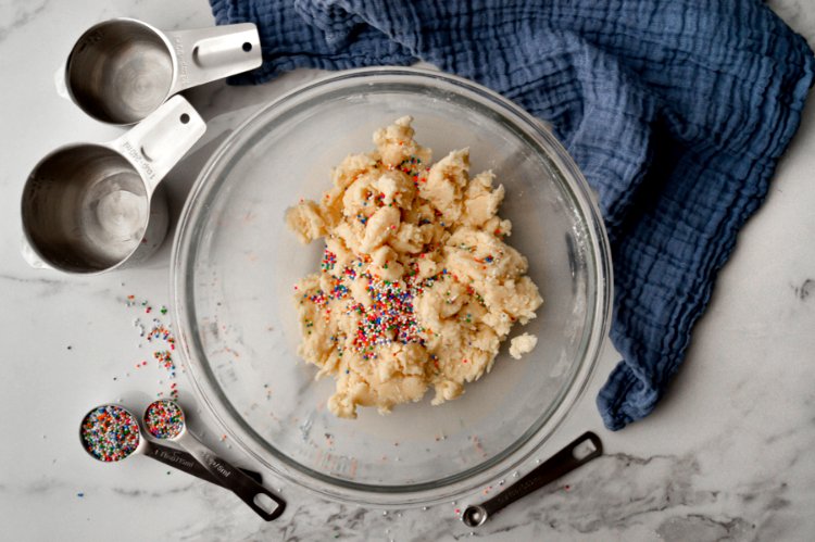 Image of Slowly add the flour and mix until a dough forms....
