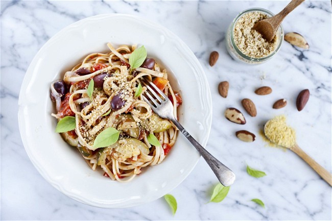 Image of Veggie one pot pasta with Kalamata olives and vegan nut parmesan