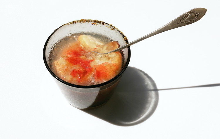Image of Optionally, you can rim the glass with lemon juice and a bit more Mishmish for extra flavor.