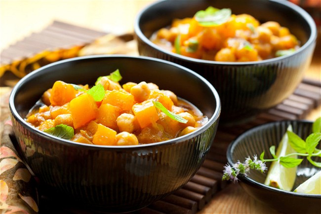 Image of Slow Cooked Goan Red Butternut Pumpkin, Sweet Corn, English Spinach, Button Mushrooms & Chick Peas