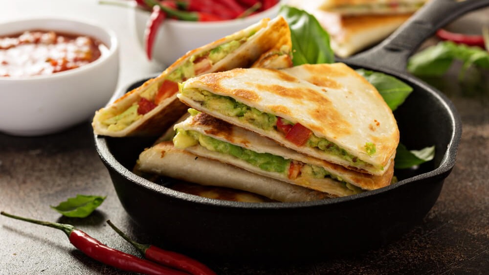 Image of Vegan Quesadillas: Spicy Black Beans, Guacamole, and Cheese!