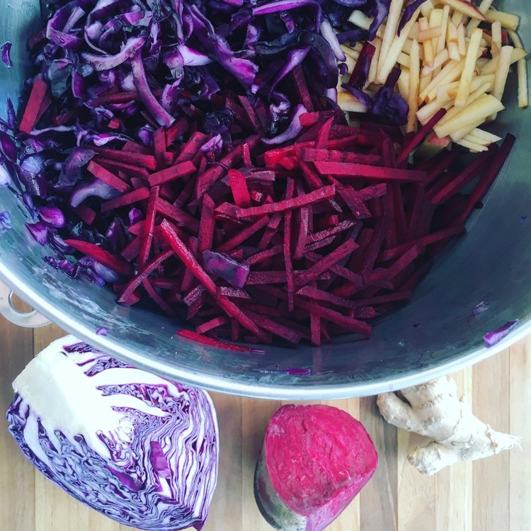 Image of In a large mixing bowl, combine your shredded cabbage and...