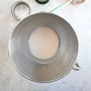 Image of In a large bowl, add the whole package of yeast,...