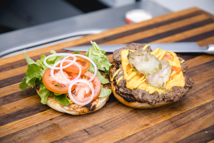 Image of Add your burger patty to the base, top with two...