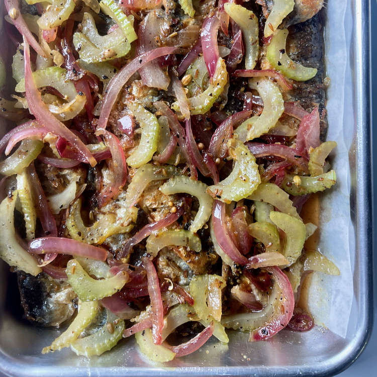 Image of Bring the mixture to a quick boil and pour evenly over seared sardines.