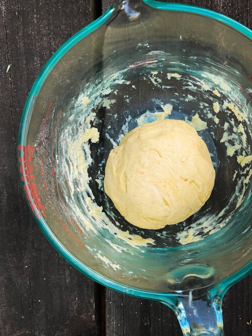 Image of Form dough into a ball, wrap in plastic wrap, and...