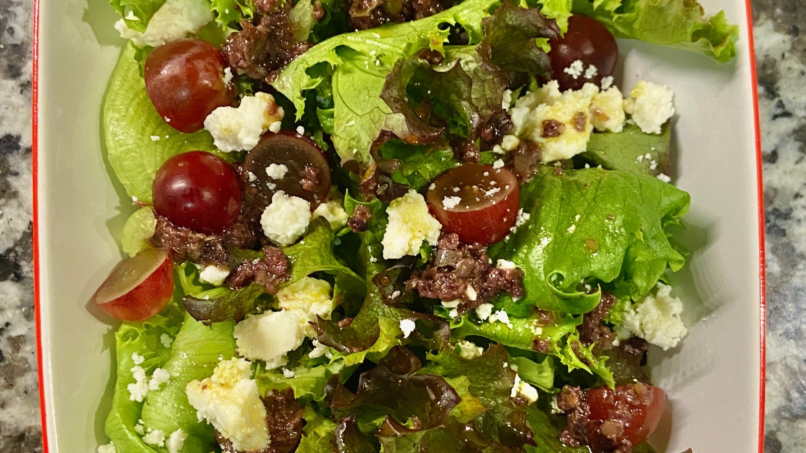 Image of Mixed Greens, Red Grapes, Ricotta Salata Salad with Tapenade Vinaigrette