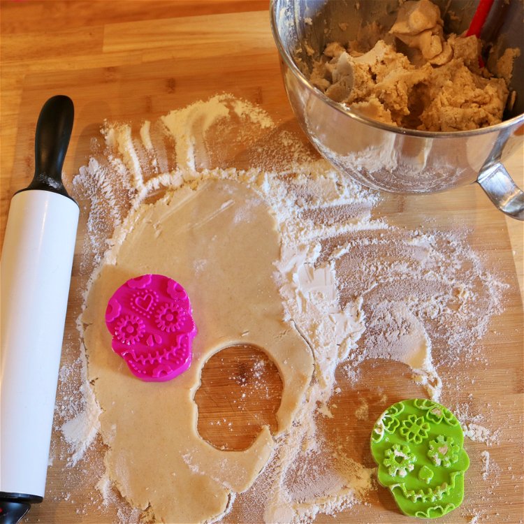 Image of Using the cookie cutter, cut out the skull shape and...