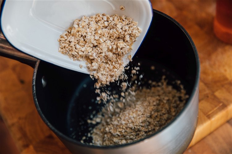 Image of In a small saucepan mix the oats, protein powder and...
