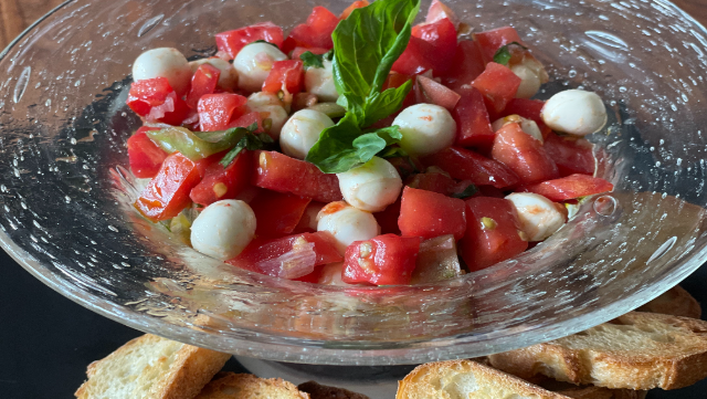 Image of Tomato Salad with Mozzarella pearls (Caprese)
