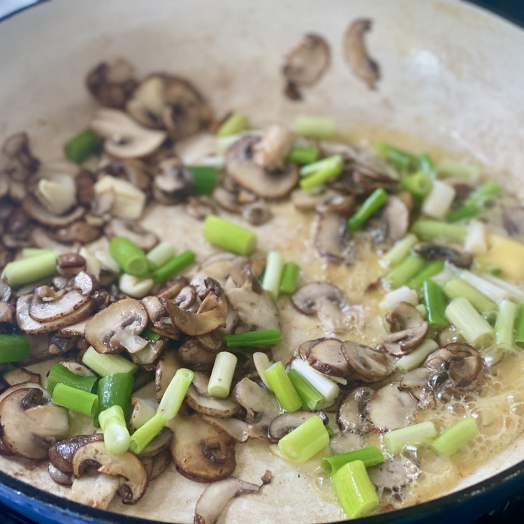 Image of When well roasted, add the butter, scallion, and garlic slices.  You want the butter to brown and the scallion and garlic to get a little golden color.