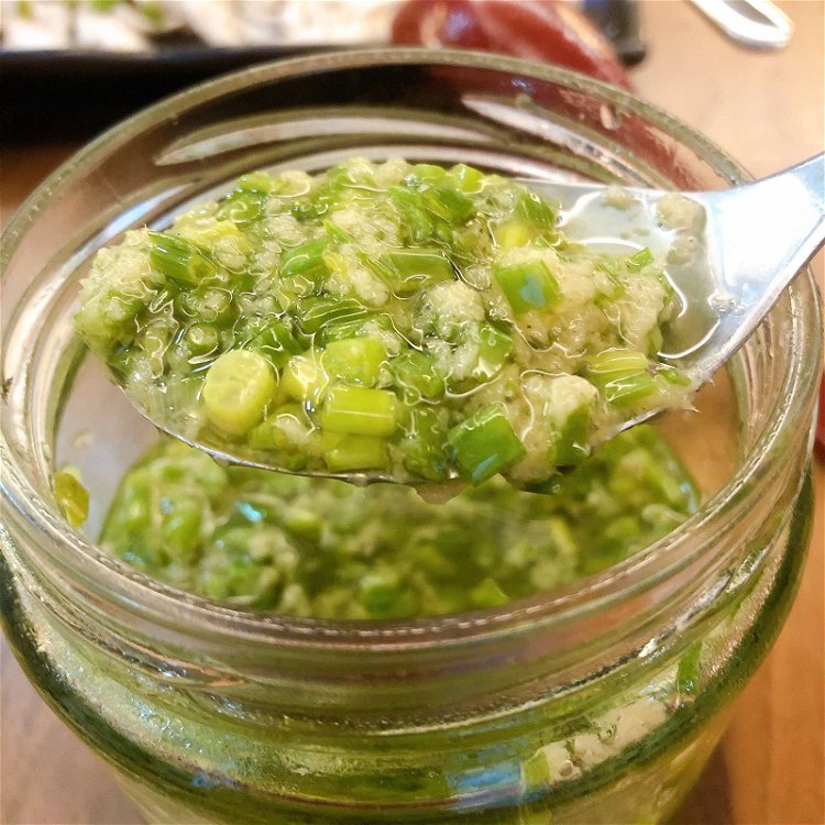 Image of Prepare GINGER SCALLION SAUCE: a. Combine chopped scallions and grated ginger...