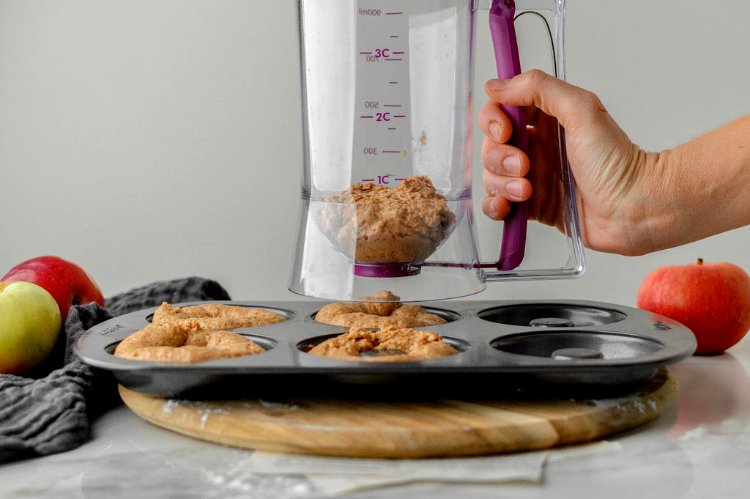 Image of Using your KPKitchen pancake batter dispenser, evenly distribute the batter...