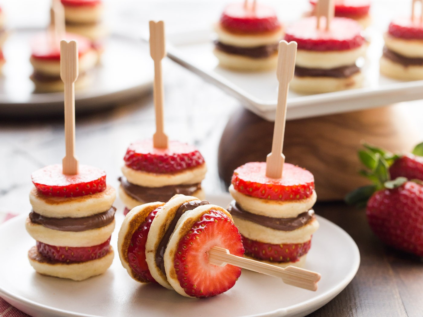 https://images.getrecipekit.com/20211116184456-garnish-with-lemon-mini-pancake-skewers.jpg?aspect_ratio=4%3A3&quality=90