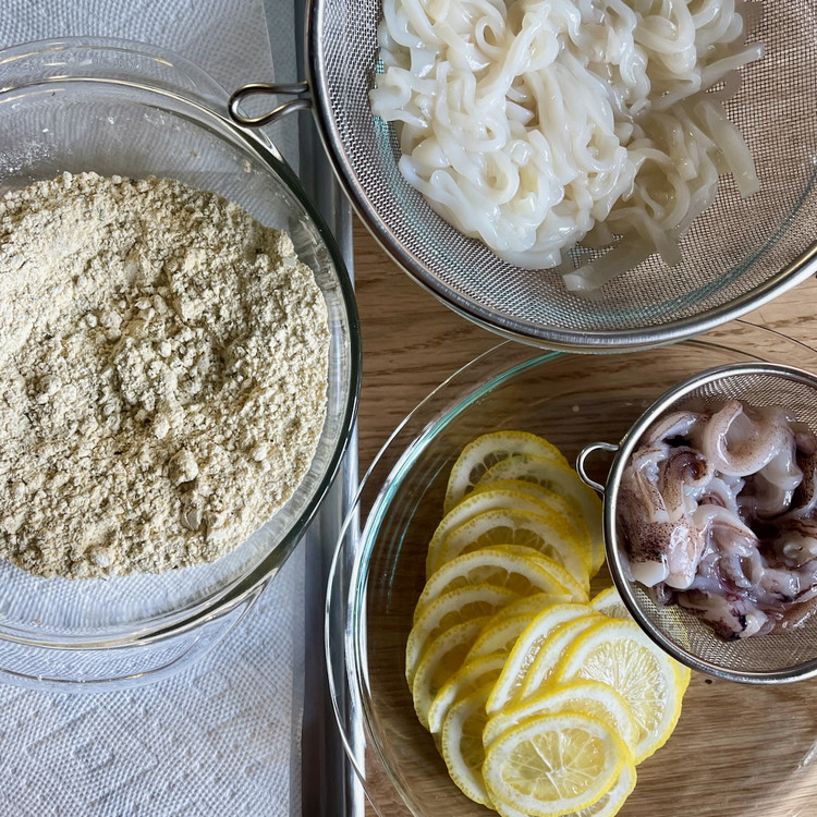 Image of Toss the teaspoon of salt through the clean and drained slices and tentacles to season.