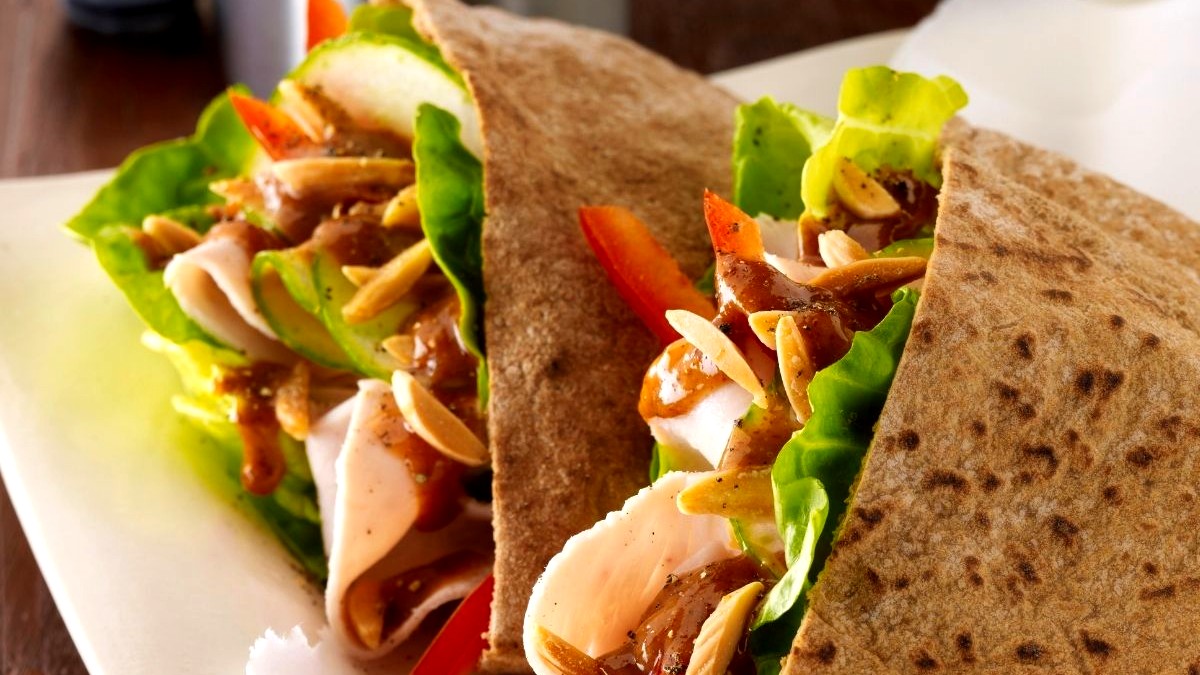 Image of Turkey and Veggie Pitas with Fiery Almond Sauce