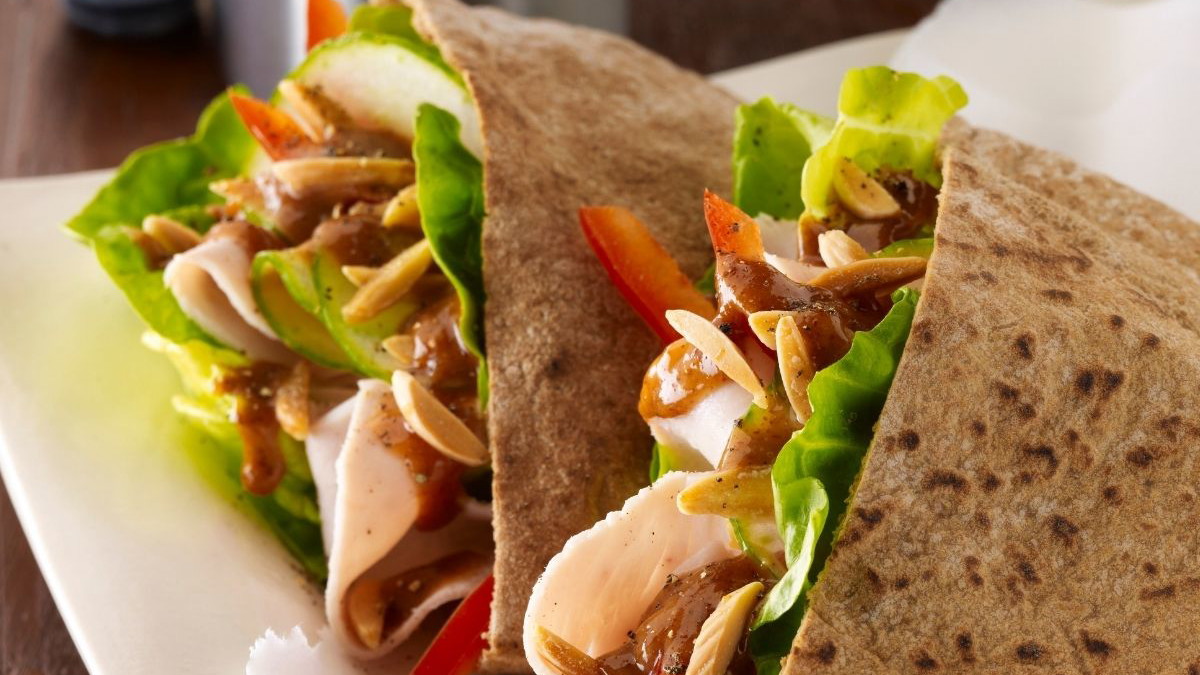 Image of Turkey and Veggie Pitas with Fiery Almond Sauce