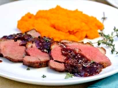 Image of Pan Seared Duck Breast with Savory Blackberry Sauce