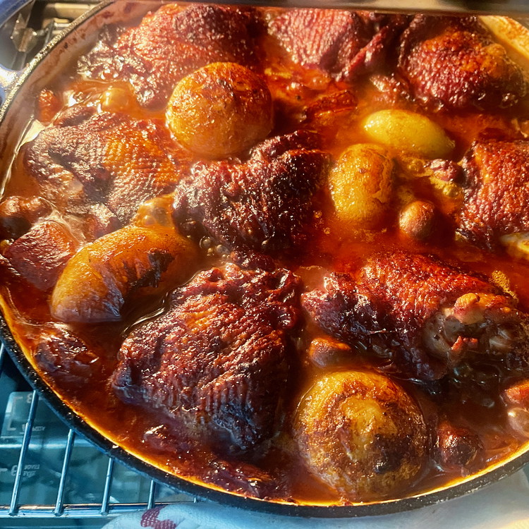 Image of When the chicken is ready, remove the pan from the oven and set aside to rest.