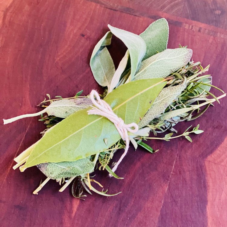 Image of Tie your fresh herbs together with string and stuff them...