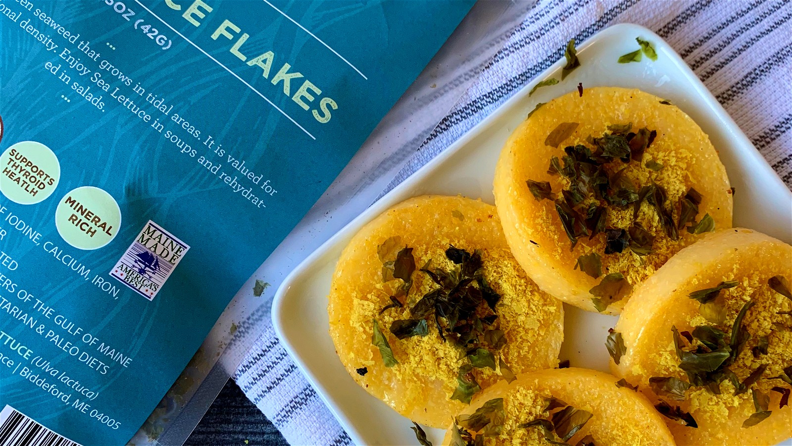 Image of Polenta Rounds Topped with Nutritional Yeast & Sea Lettuce Flakes