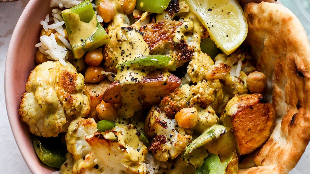 Image of Roasted Sheet Pan Cauliflower & Potatoes with Tahini Curry Sauce