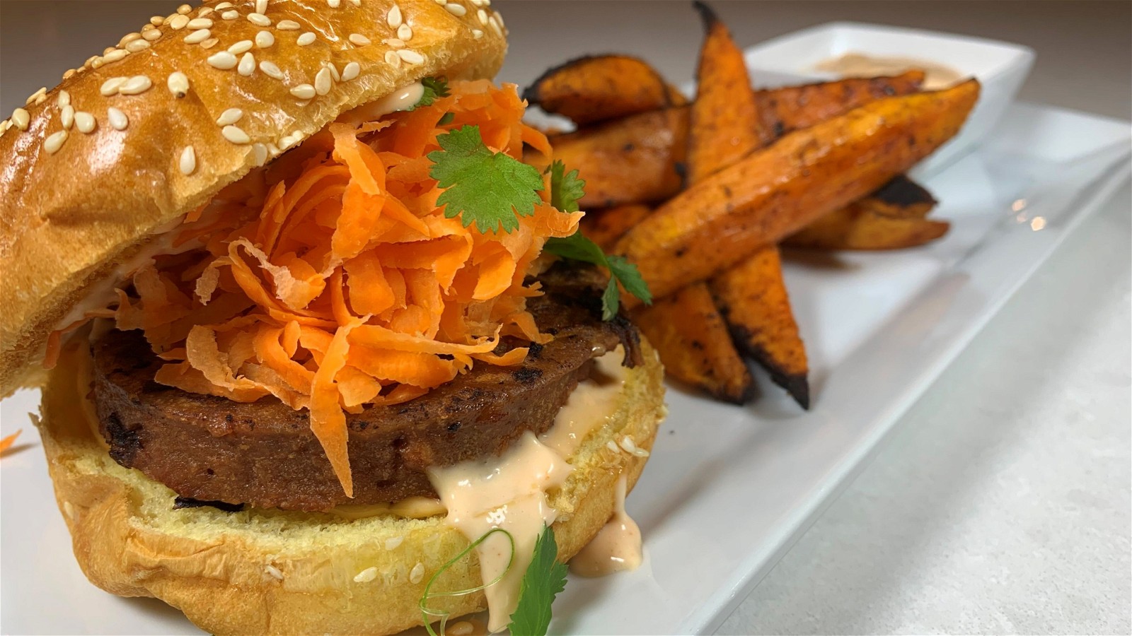 Image of Incredible Burger with Pickled Carrots, Sriracha Mayo and Sweet Potato Oven Fries 