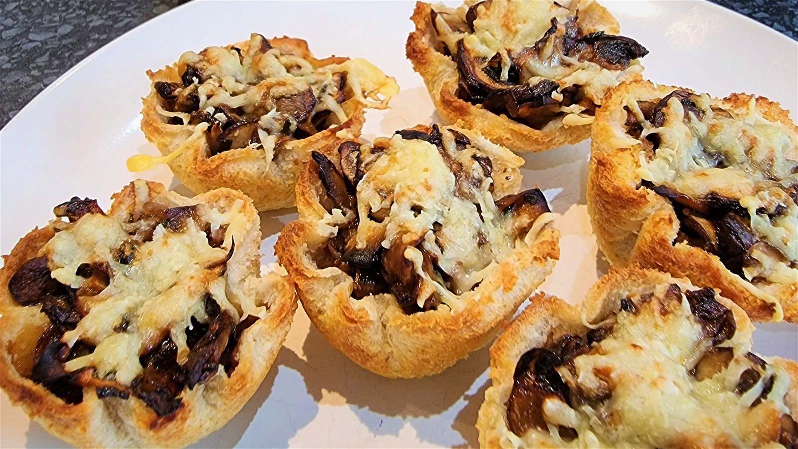 Image of Mushroom Tartlets with Black Garlic Essence