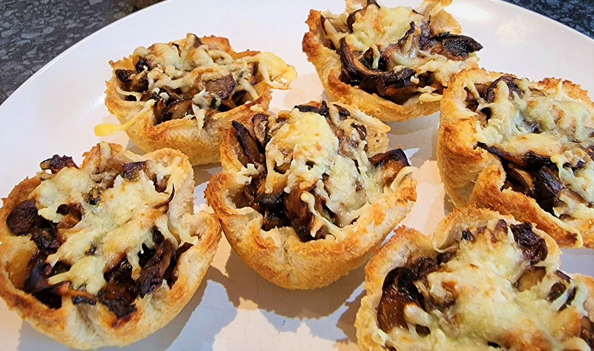 Mushroom Tartlets with Black Garlic Essence