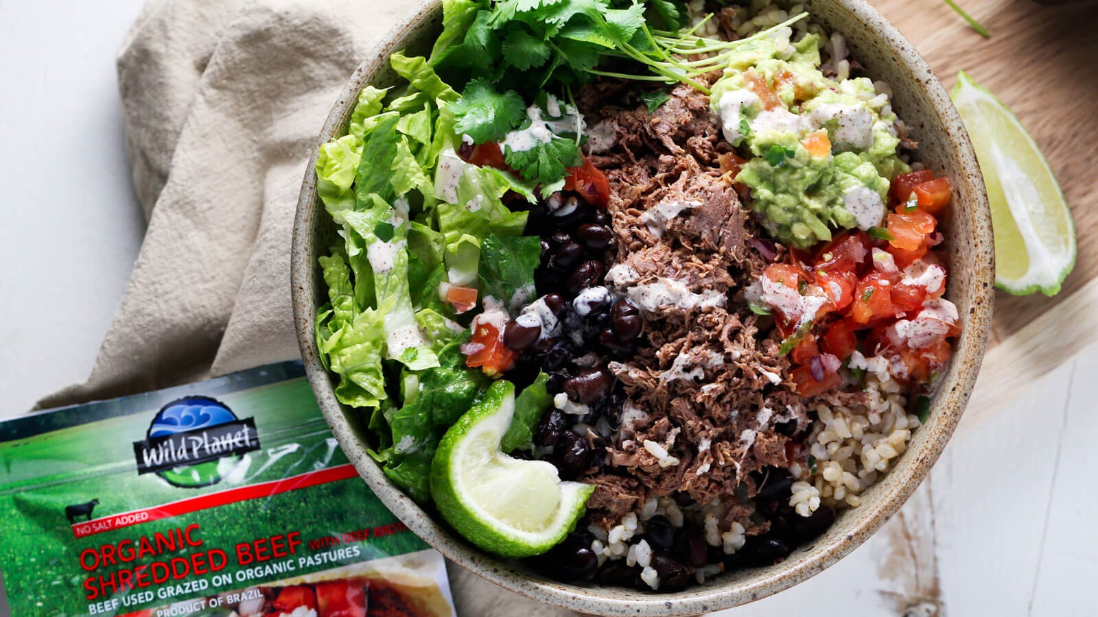 Shredded Beef Burrito Bowl with Chili Lime Crema | Wild Planet Foods recipe