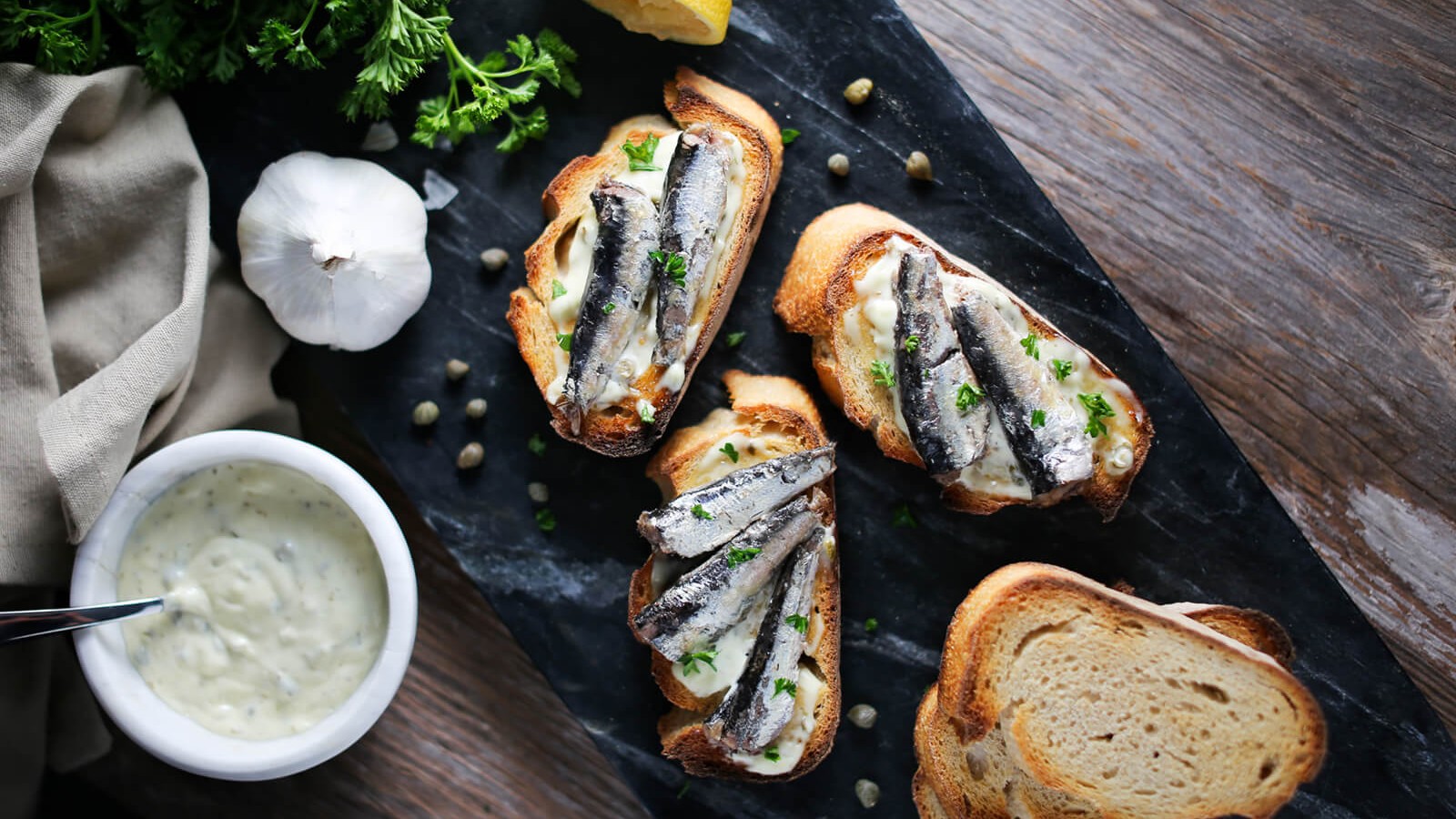 Image of White Anchovies Crostini with Lemon Aeoli