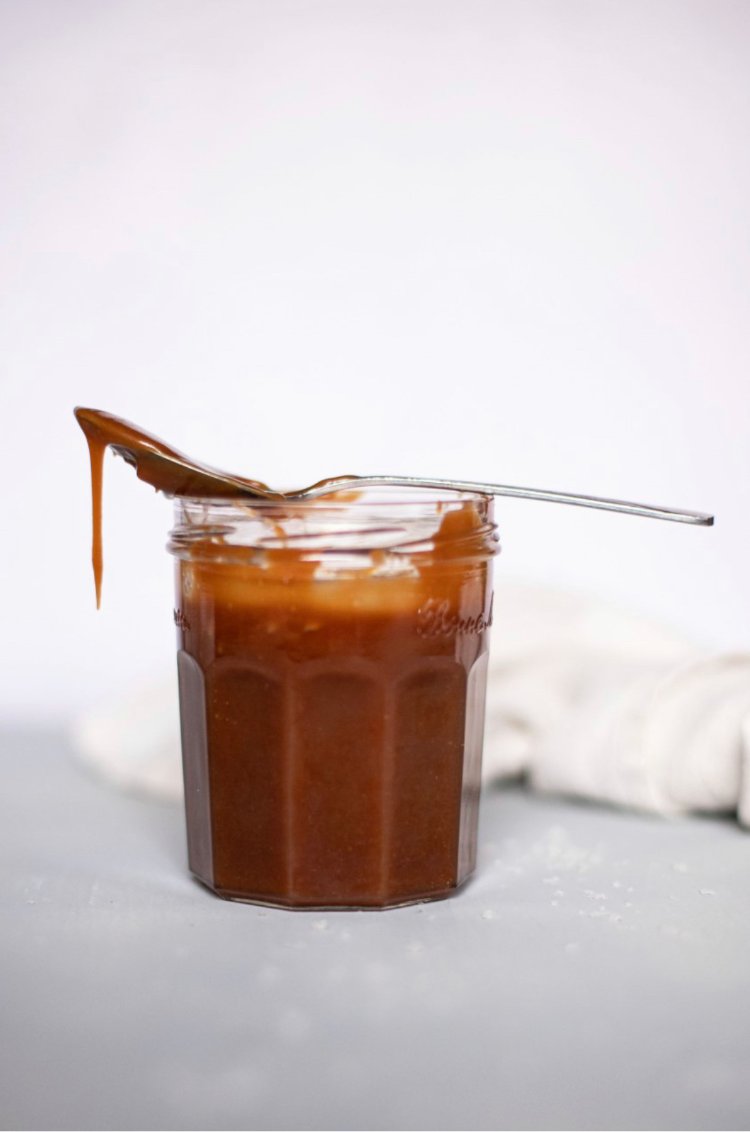 Image of Pour the caramel into a heat-proof glass jar and allow...