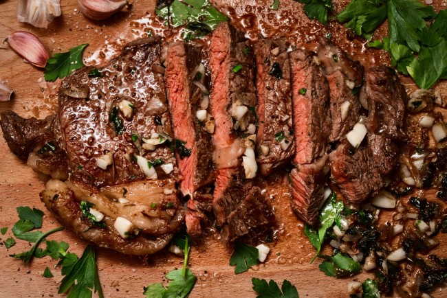 Image of Sizzling Sirloin Steak with Garlic Butter