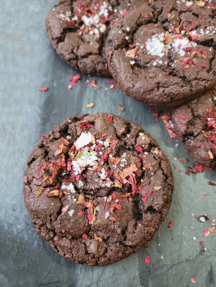 Image of Sprinkle with Slack Tide Flake Sea Salt and dried pomegranate flowers if you are using them. Bake for 8-10 minutes. Let the cookies cool completely before removing them from the tray.