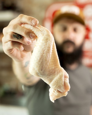 Image of Prepare the wings by removing and discarding the wing tip . Separate the drummette and wing sections.