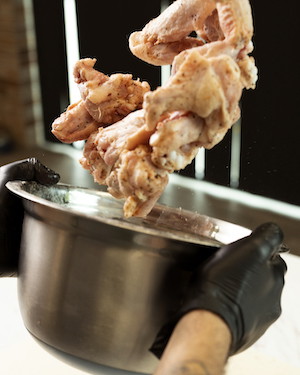 Image of Combine the baking powder, corn flour and a good sprinkle of SPF53. Toss the wings in the mixture until the are coated evenly. place on a baking tray and set aside to 'wet and set'. for about 15 mins. This...