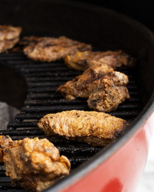Image of Place the wings on the indirect part of the grill (depending on how your baskets/cone are positioned), close the lid and check after about 30 mins. Look for crispy skin and a nice golden colour before removing them