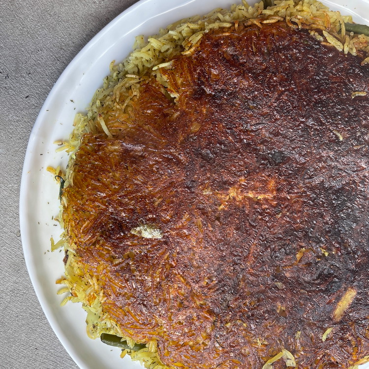 Image of Serve while warm and crispy with more Persian Crunch to sprinkle onto each portion.  