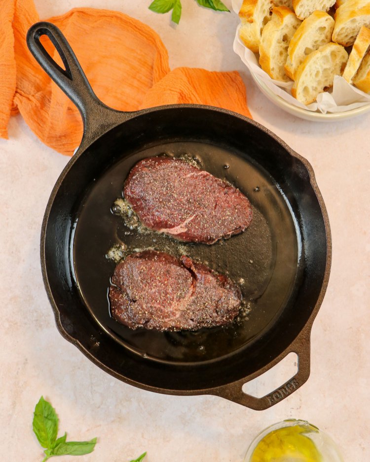 Image of Add the steaks into the hot pan, cooking for 3-4...