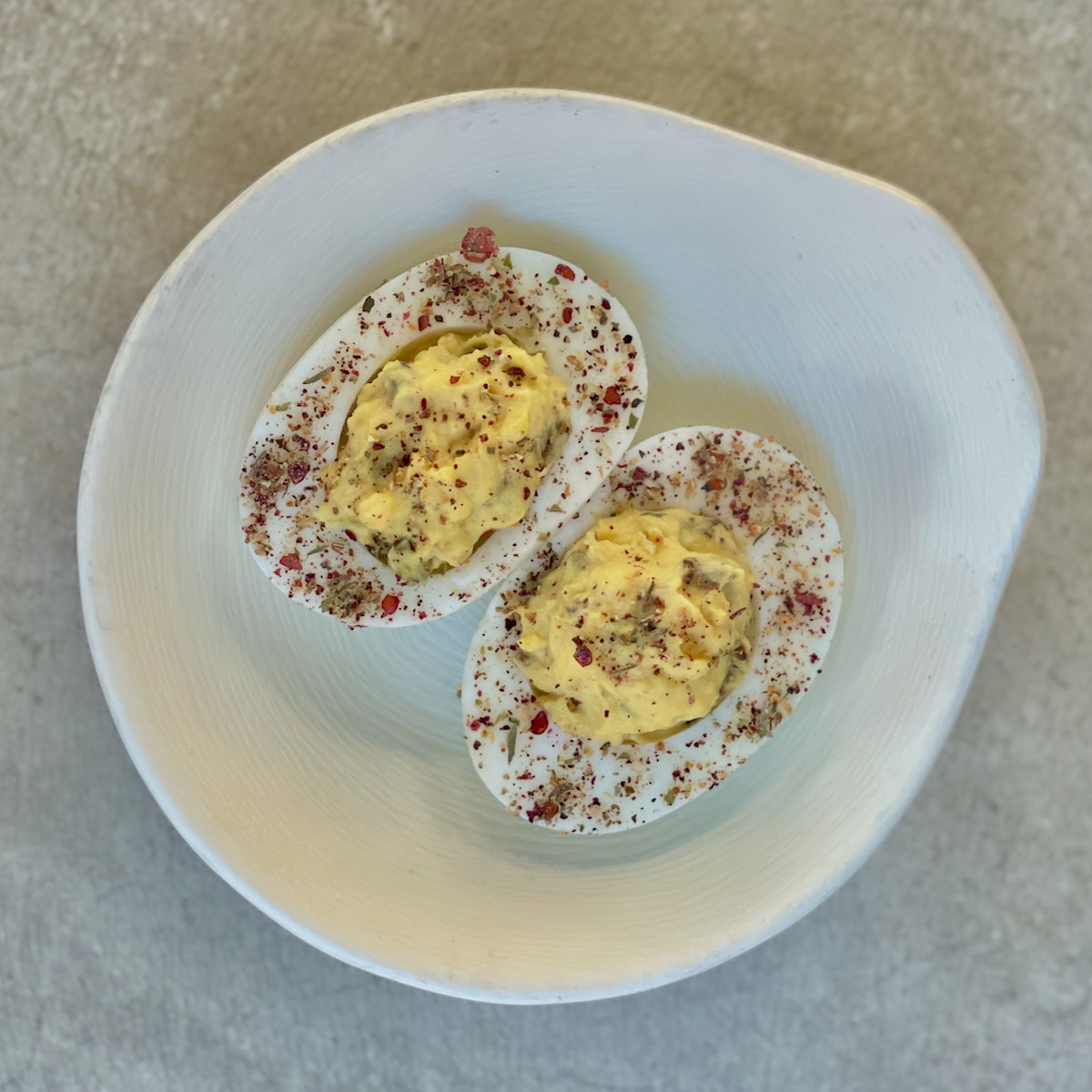 Tahini & Olive Deviled Eggs with Mint & Sumac