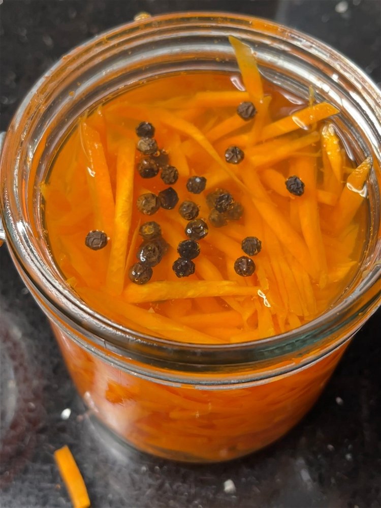 Image of Then add your carrots to the pickling solution and store...