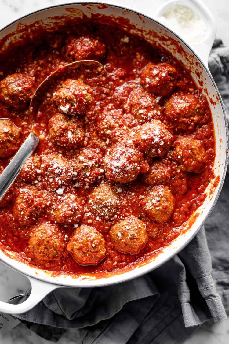 Image of Let meatballs heat in sauce for 2 mins to take...