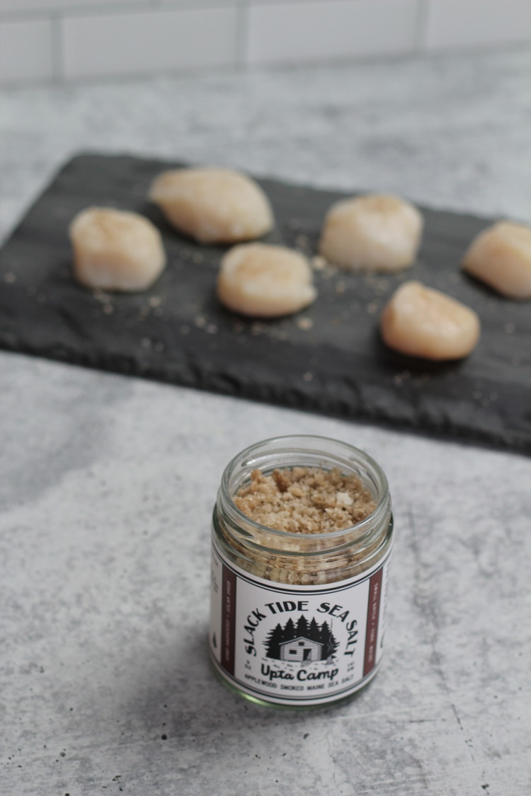 Image of Place scallops salted side down in pan, being careful not to crowd the pan or else you run the risk of steaming them. Better to cook in batches than lose the beautiful crust! 
